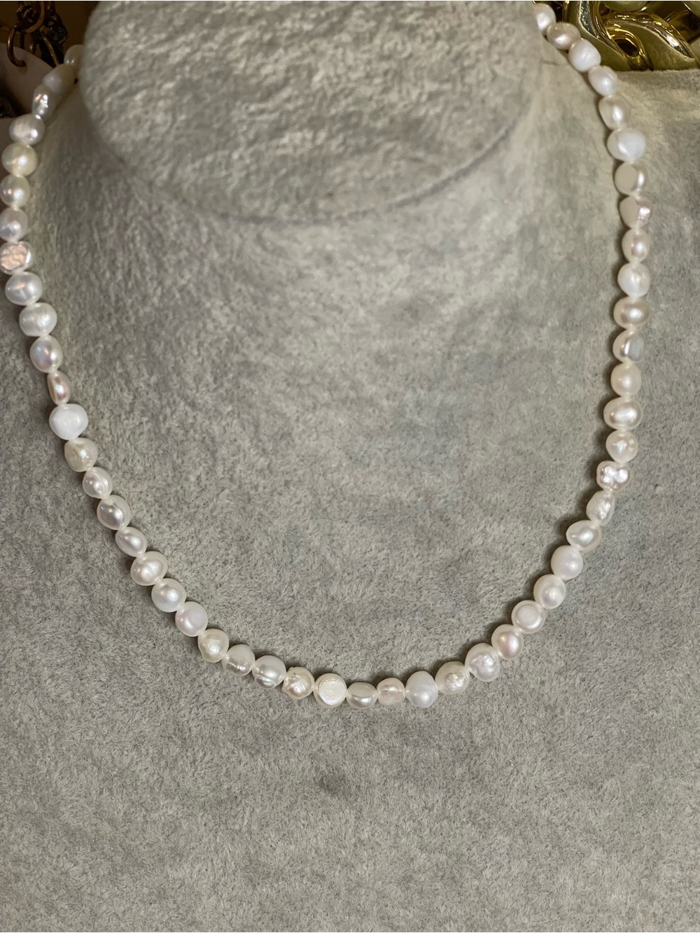 Genuine pearl necklace on sterling silver chain